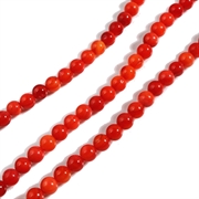 Shell perler.  Naturlige. 6 mm. Røde nuancer. 